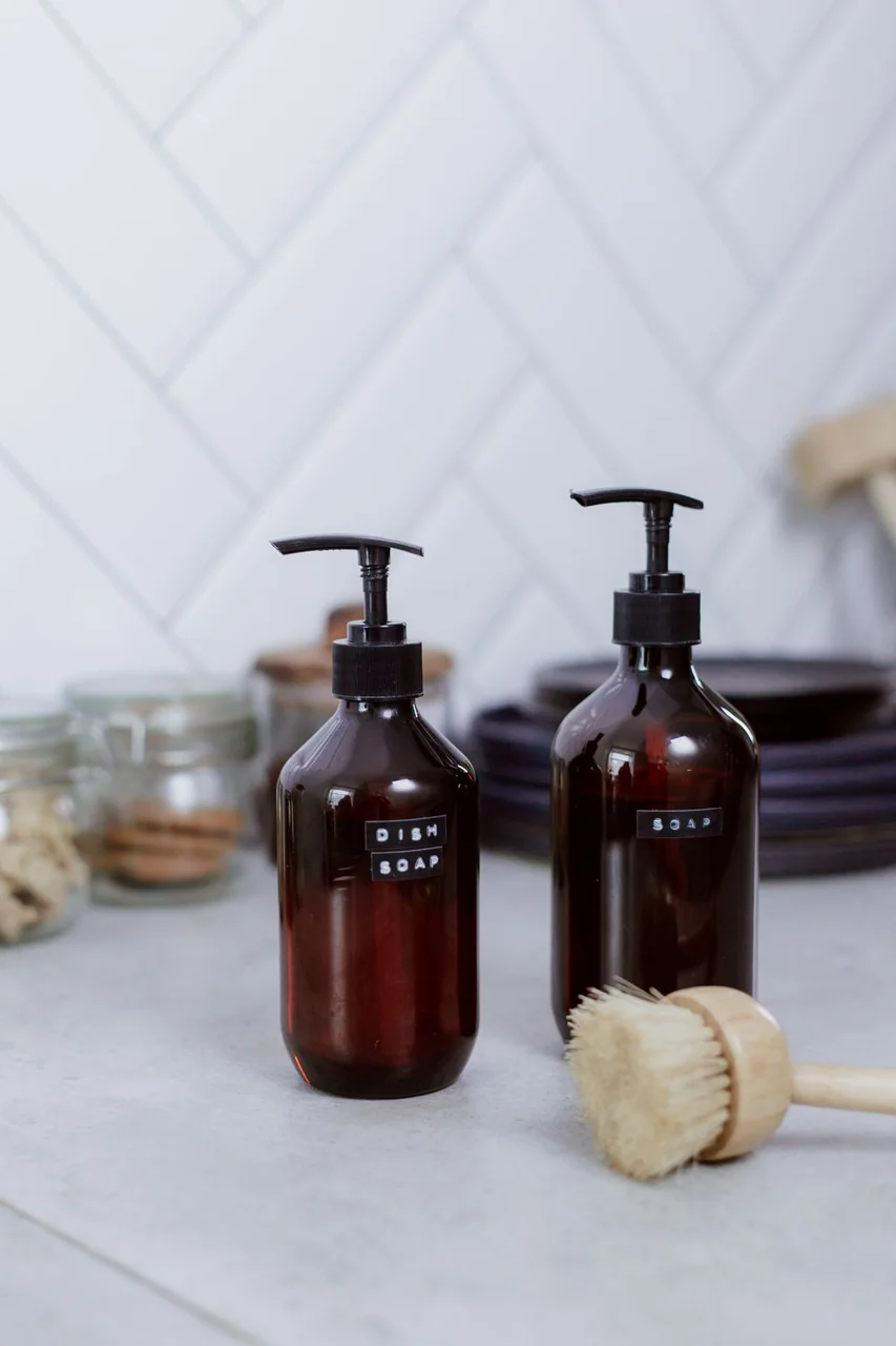 Organized kitchen countertop and cleaning supplies