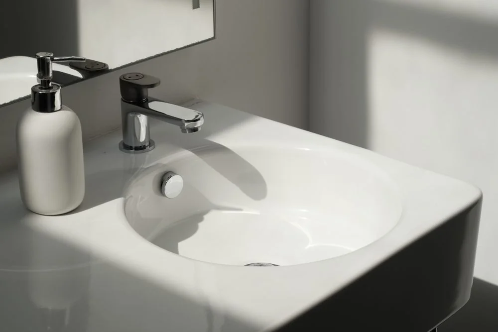 Sparkling clean bathroom sink and fixtures